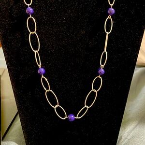 Long silver chain with blue beading